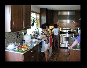 Meanwhile, inside, the girls are whipping up a real feast.